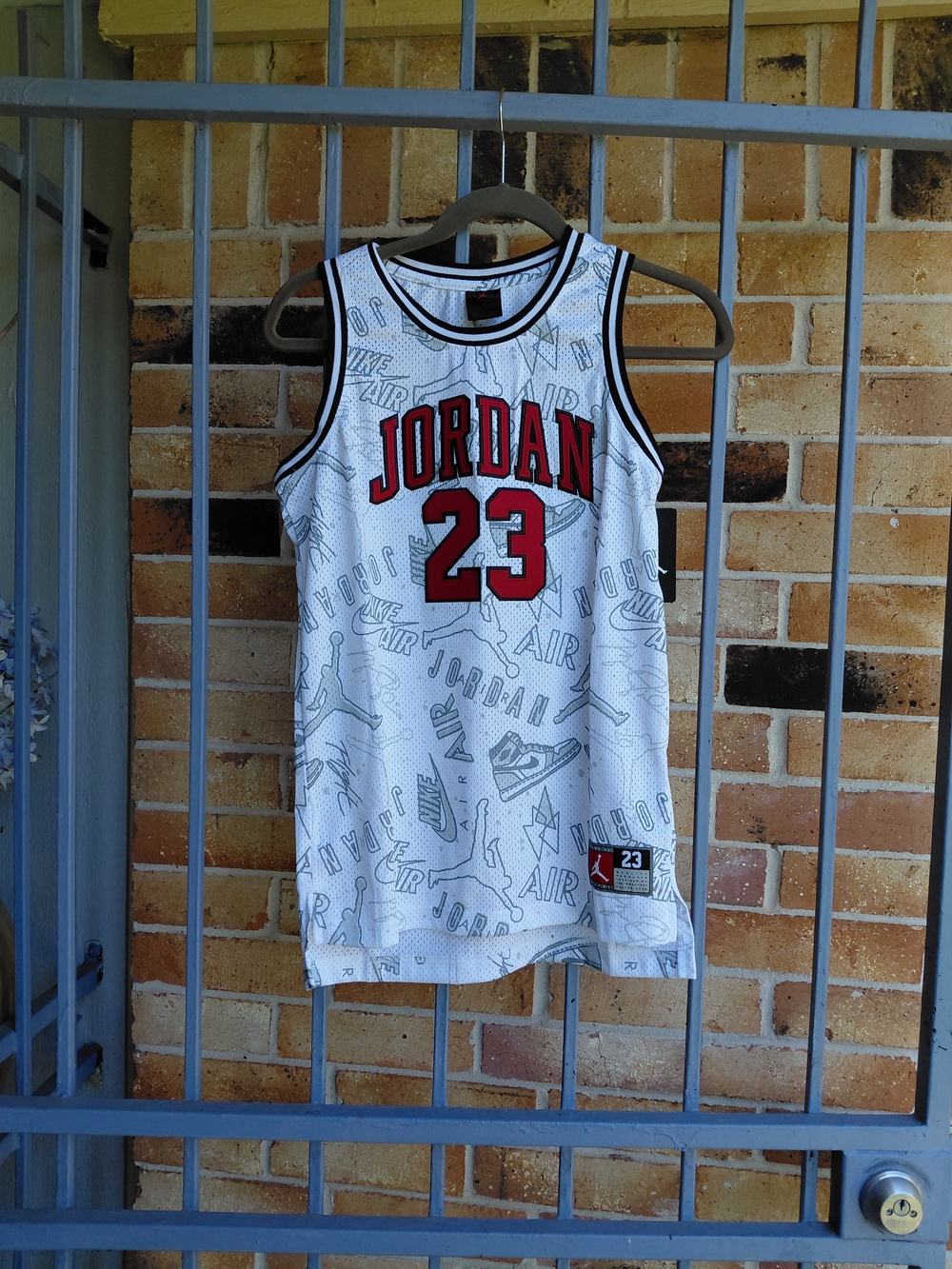 Jordan 23 White Graphic Basketball Jersey Jrs .